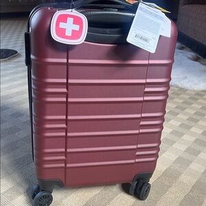 Swiss Gear -Ribbed 19 inch  Carry-On Luggage  burgundy brand new w tags